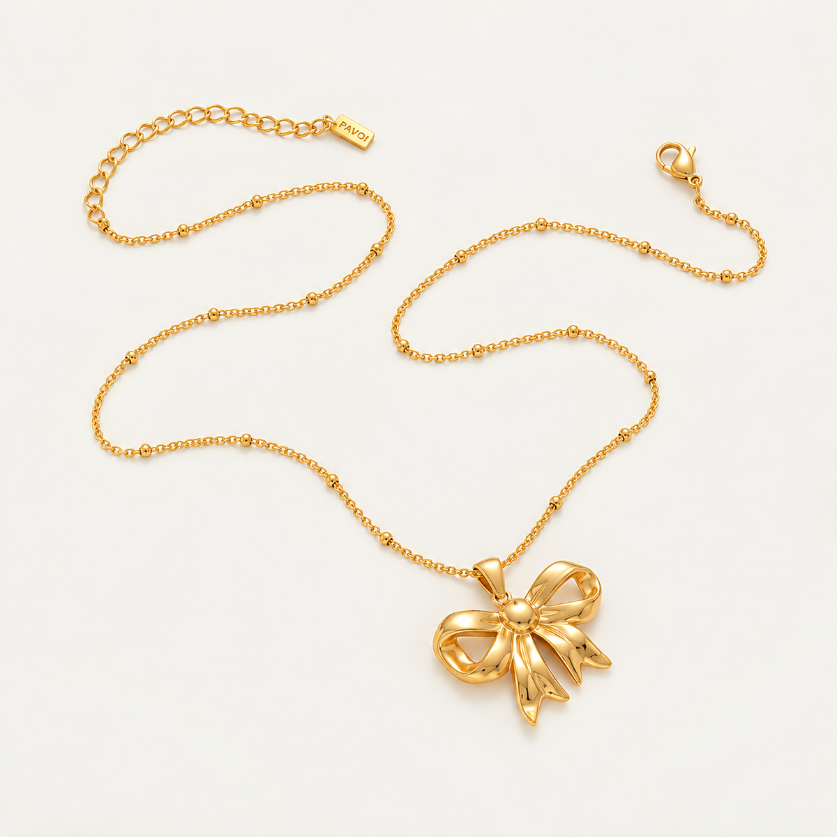 Polished Bow Pendant Necklace